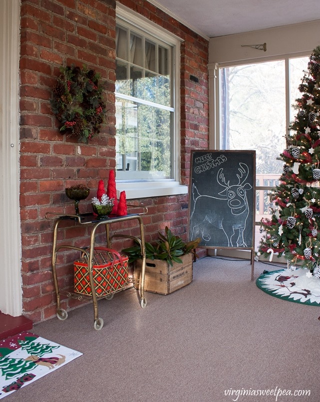 Vintage Inspired Christmas Porch - Get ideas for decorating your porch for Christmas. virginiasweetpea.com