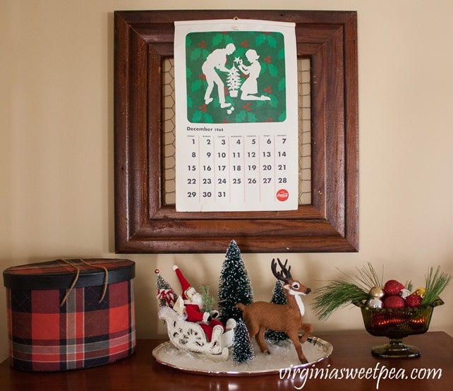 Christmas in the Family Room - Tour a room filled with vintage Christmas treasures including a 1968 Coca-Cola calendar. - virginiasweetpea.com