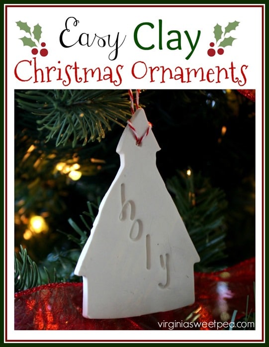 Clay ornament shaped like a church with holy stamped on it