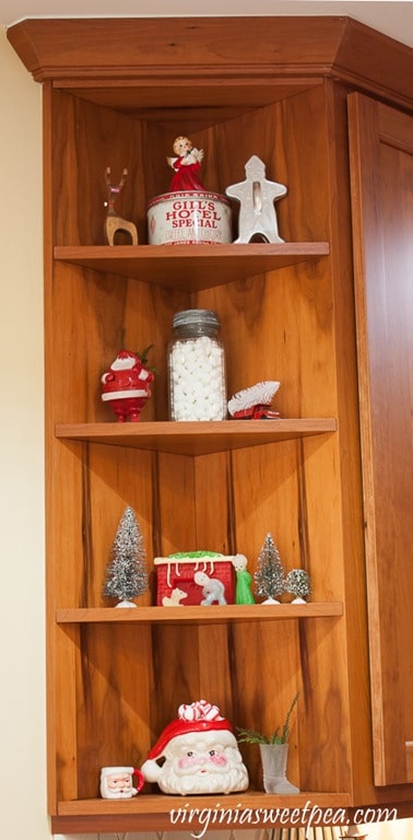 Kitchen Shelves Decorated with Vintage Christmas - See a kitchen decorated for Christmas with vintage finds. virginiasweetpea.com