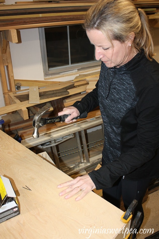 How to Make a DIY Under Bed Storage Drawer - Steps to Assemble the Drawer -Nail the bottom into place.