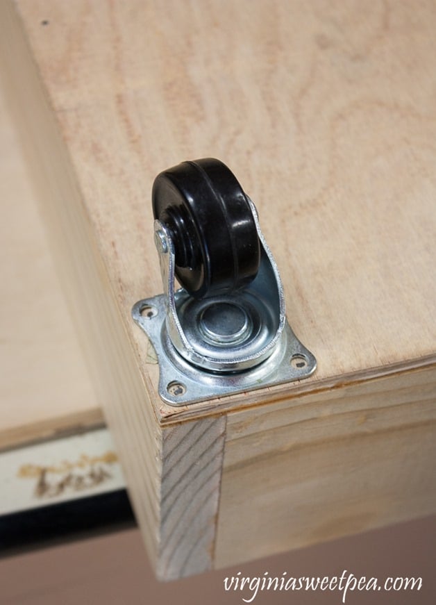 Adding caster wheels to a DIY under bed storage drawer