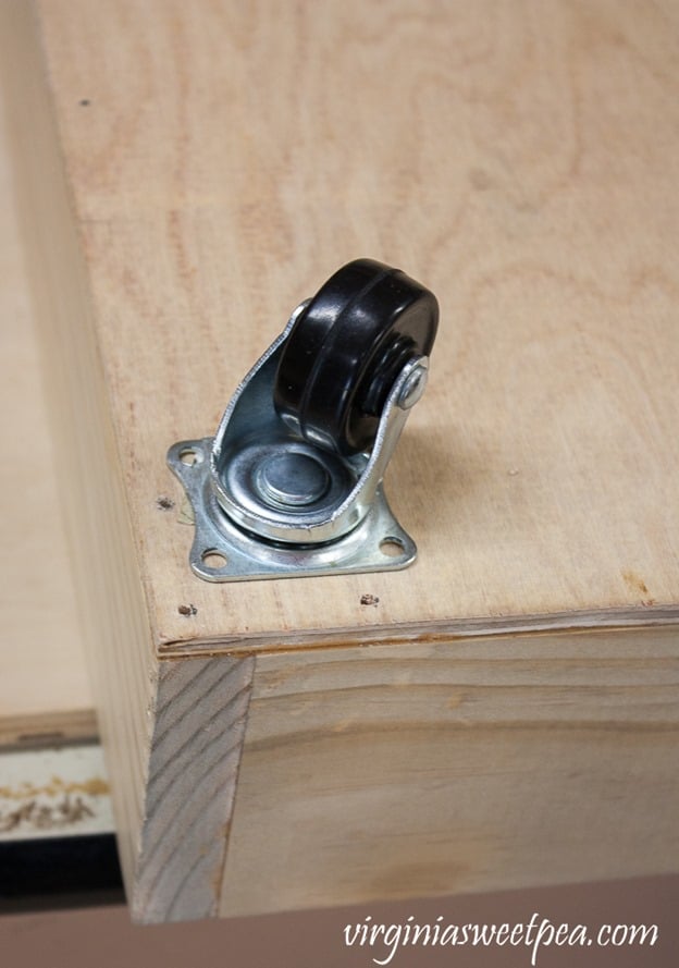 Adding caster wheels to a DIY under bed storage drawer