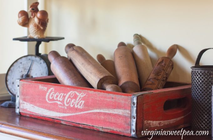 Vintage Kitchen Decor - Farmhouse style decor fills a kitchen hutch. virginiasweetpea.com