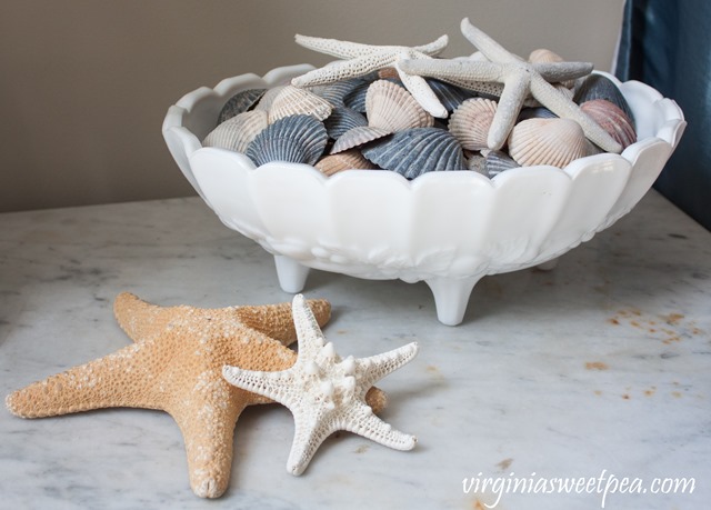 Shells in a milk glass compote 