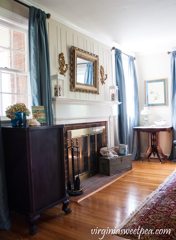 Living Room Decorated for Summer with a Beach Theme incorporating Vintage Items.