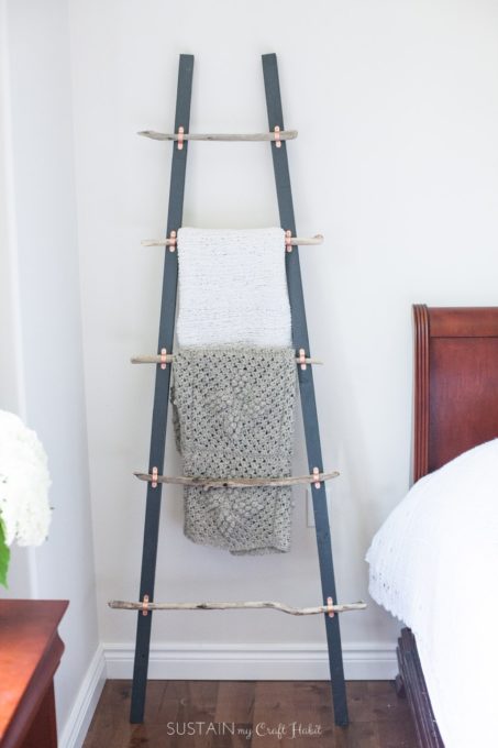 How to Make a DIY Blanket Ladder with Driftwood Pieces - Best of the Best Coastal DIY Decor Round-up. Get over a dozen coastal project decor ideas that you can make for your home. #coastal #coastaldecor #coastaldiy