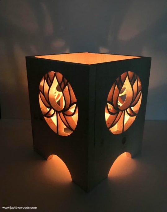 DIY Scroll Saw Lantern - Learn how to make this gorgeous lantern using a scroll saw. So pretty! #woodworking #scrollsawproject 