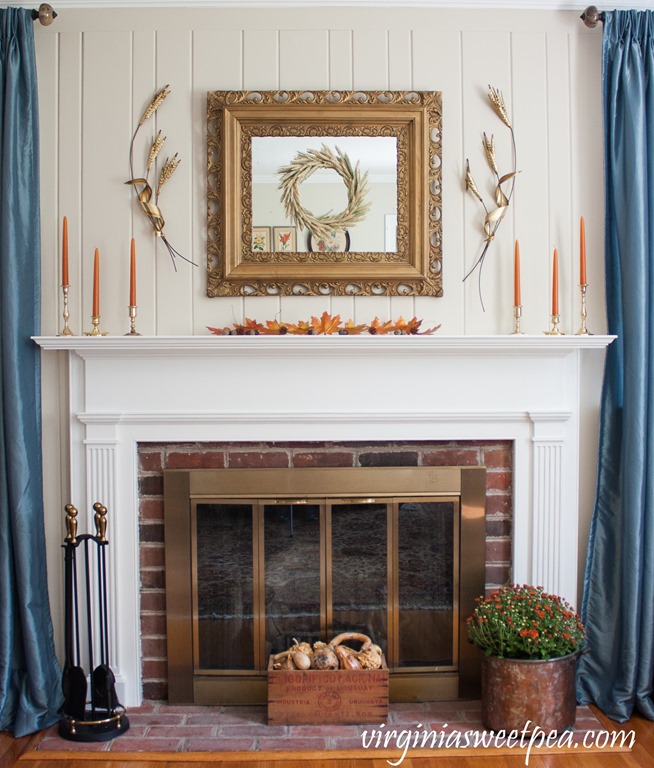 Decorate a Traditional Fall Mantel that Incorporates Vintage - Get ideas for decorating your mantel for fall. #fall #falldecor #fallmantel #vintagedecor