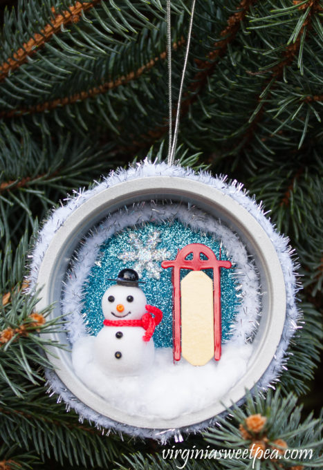 Handmade Winter Wonderland Christmas Ornament - You'll never guess what was upcycled to make this pretty ornament! #christmascraft #handmadechristmas #decoratethetree #christmastreeornaments #christmastreeideas