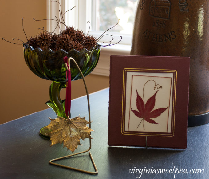 Vintage Fall Decor in the Family Room - A fall vignette using both vintage and new items.