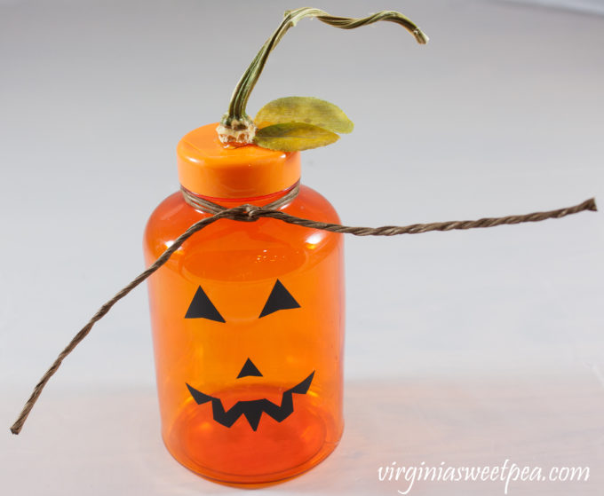 Jack-o-Lantern made using an orange medicine bottle