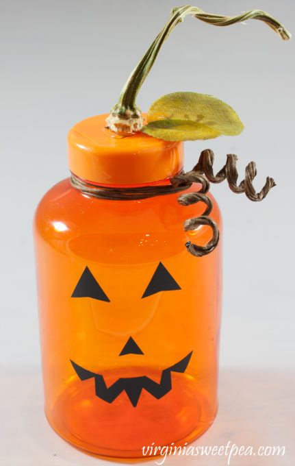 Jack-o-Lantern made using an orange medicine bottle