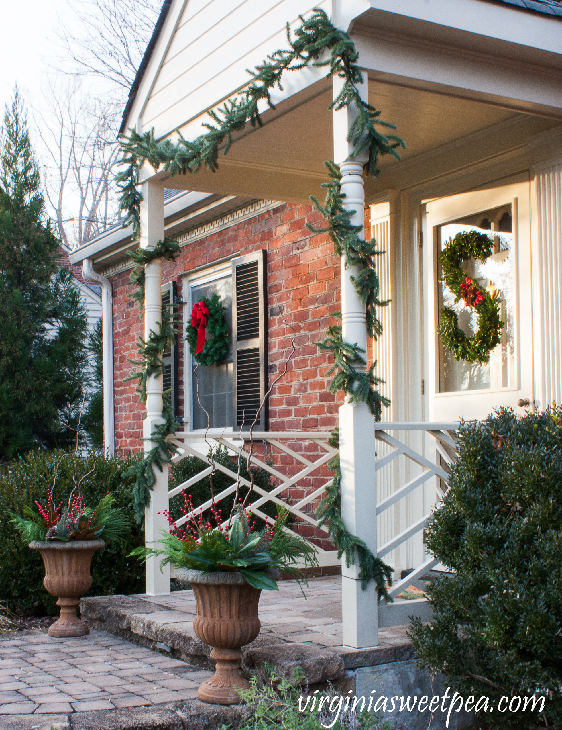 Christmas Front Porch and Holiday Door Decor - Get ideas for decorating your porch and doors for Christmas. #christmas #christmaswreath #christmasdoors #christmasoutdoors #christmasdecor