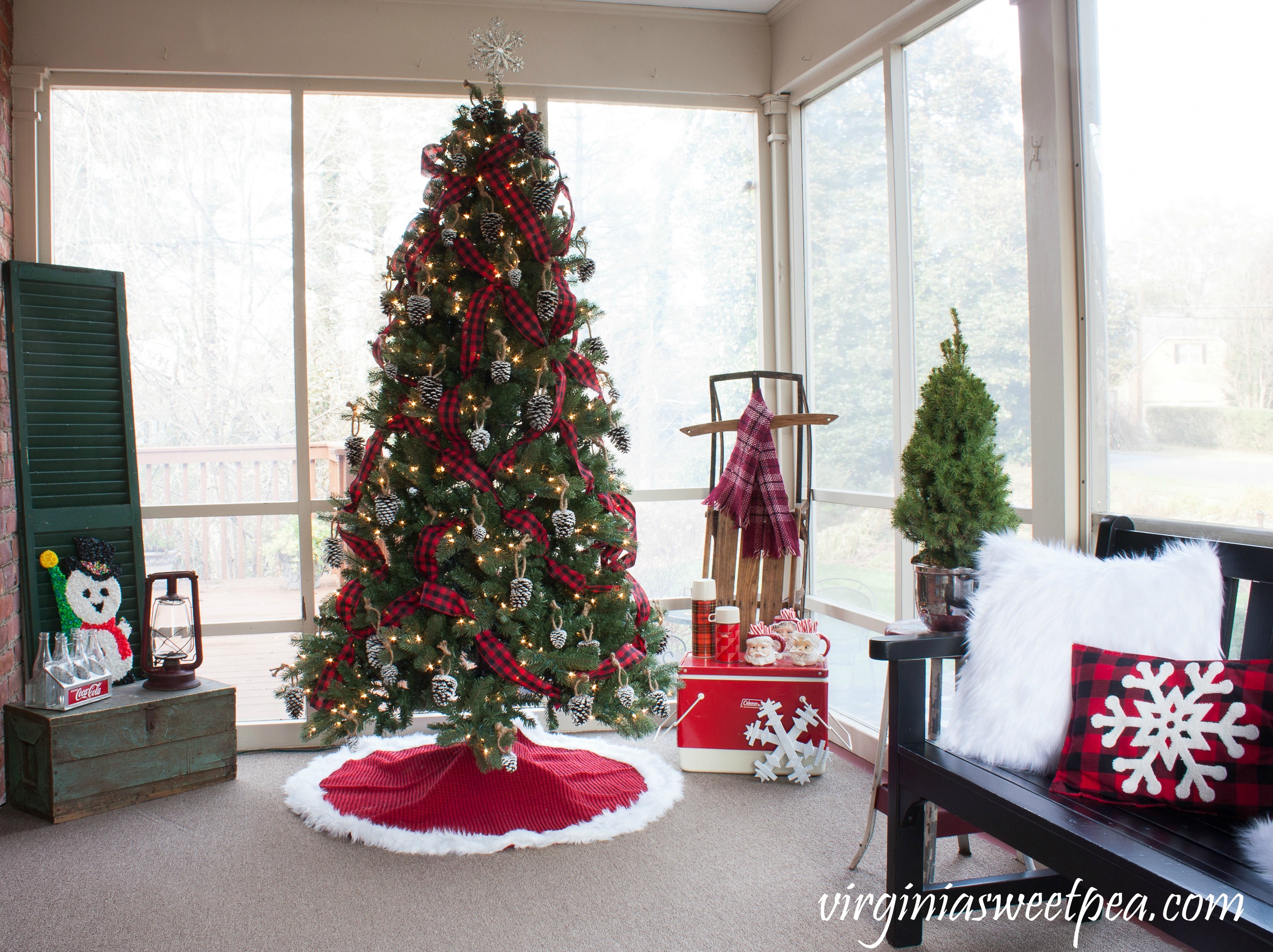 See a porch decorated for Christmas using mostly vintage decor and get ideas for decorating your Christmas porch from 18 bloggers. #christmas #christmasdecor #christmasporchdecor #christmasporch #christmasdecorations #vintage #vintagechristmas