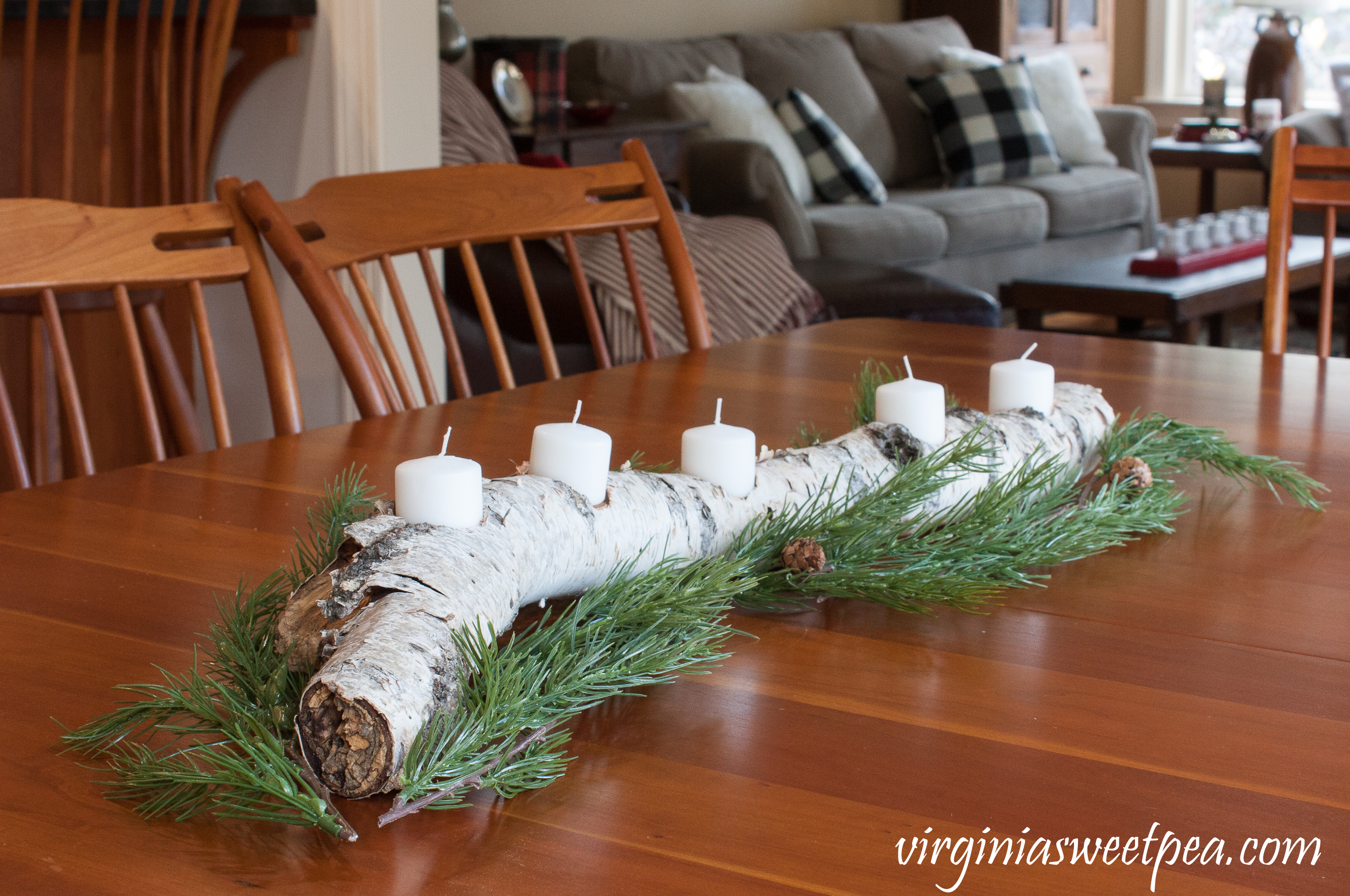 Learn how to make a yule log to use for winter decor in your home. #yulelog #diy #woodworking