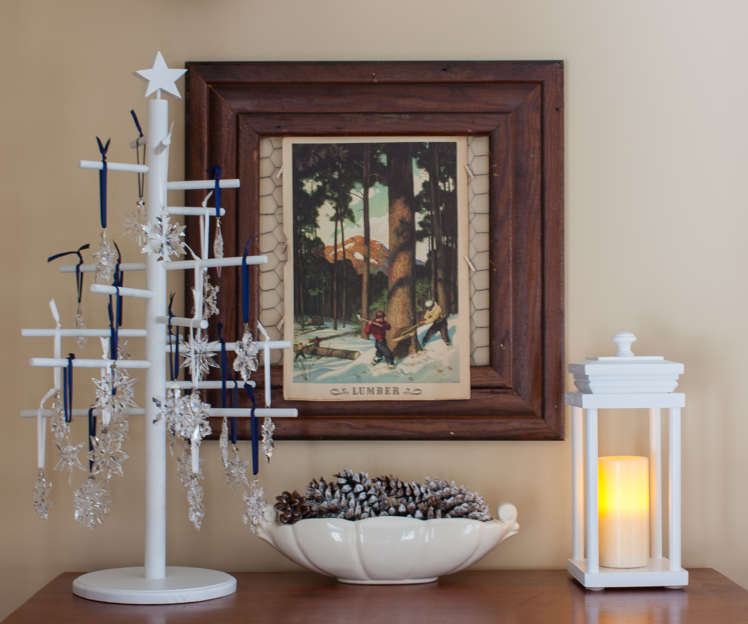 Decorating for Winter - Swarovski Snowflakes, pinecones, candles, and a 1963 Coca Cola picture #cocacola #swarovski #vintage