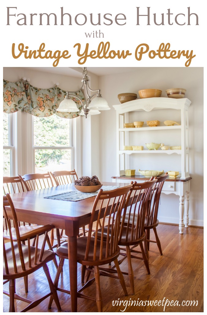 Farmhouse Hutch with Vintage Yellow Pottery - See a collection of vintage yellow pottery displayed on a farmhouse-style hutch. Vintage mixing bowls on top of the hutch add to the charm of this display. #vintage #vintagedecor #vintagepottery #farmhousedecor #USApottery #mccoy #mccoypottery #watts #cooksonpottery #abingdonpottery