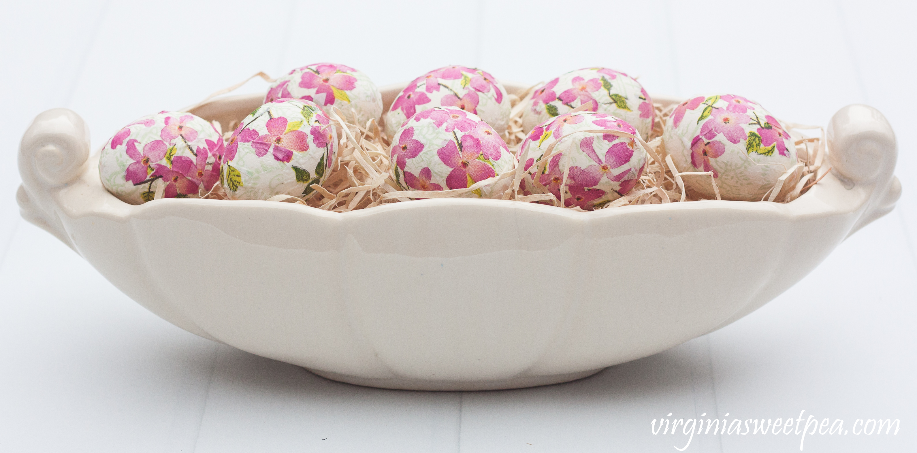 Eggs decoupaged with Caspari napkins in Blooming Branches arranged in a vintage Abingdon Pottery console bowl in the Fern Leaf pattern