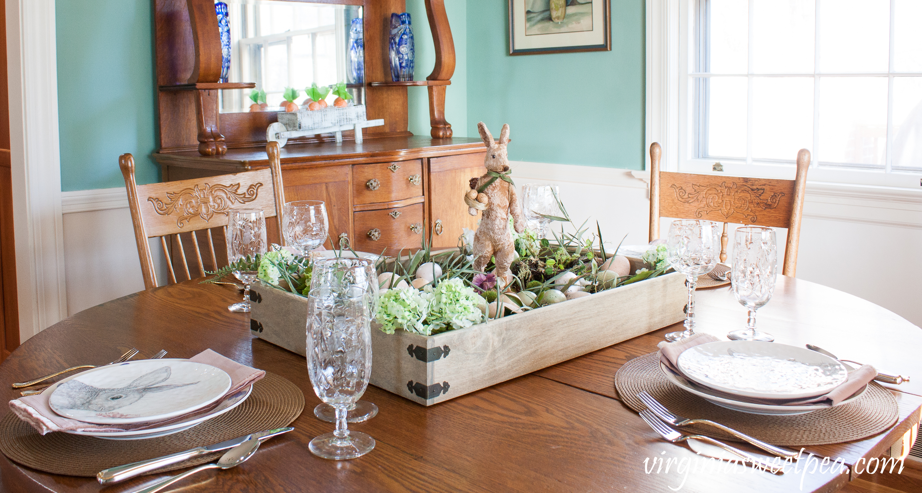 Farmhouse Style Easter Centerpiece and Easter Tablescape - Farmhouse Style Easter Centerpiece & Table - Get ideas for making a farmhouse style Easter centerpiece and ideas for table decor for your Easter table. #easter #eastercenterpiece #eastertablescape #farmhouse #farmhousecenterpiece #farmhousetable #eastertable