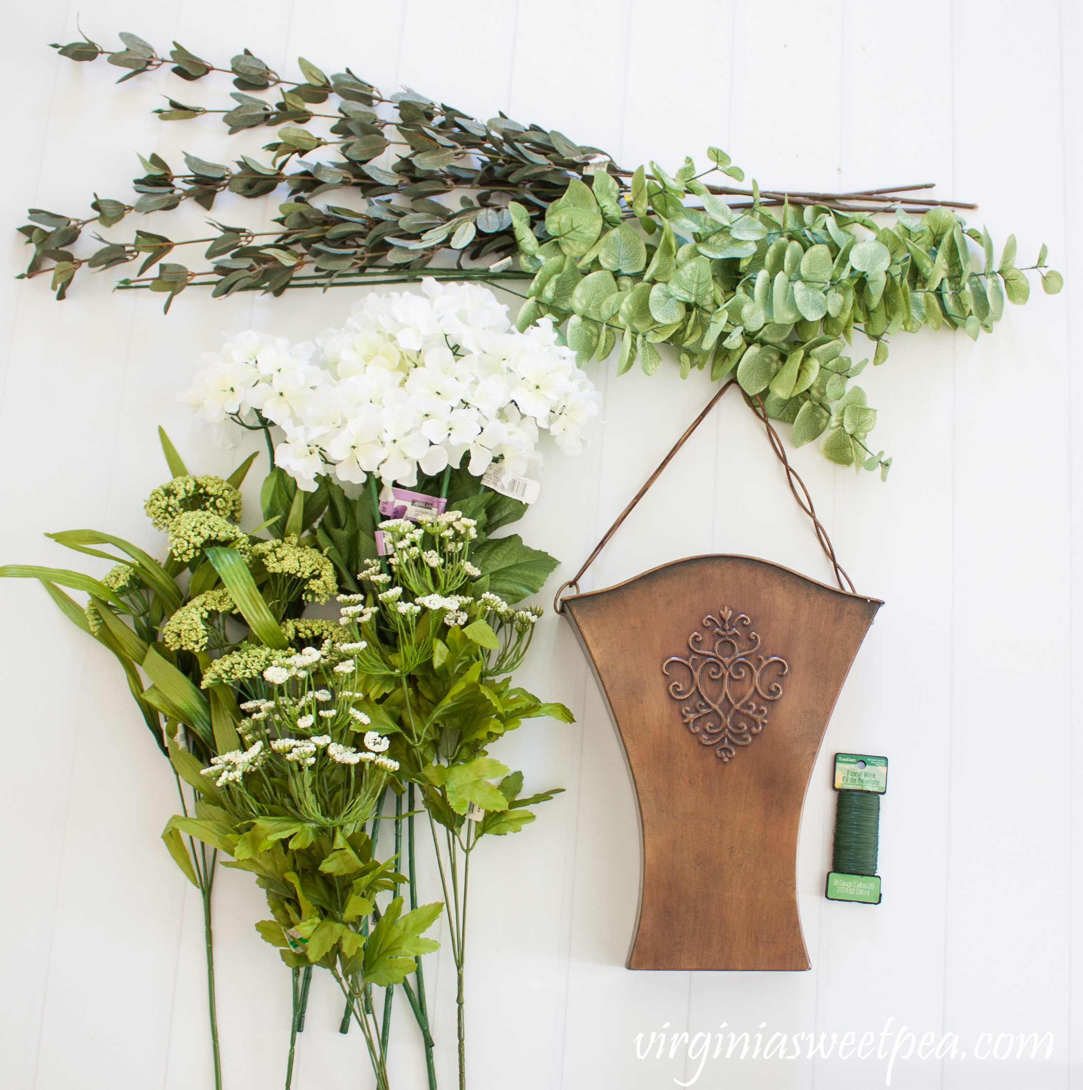 Supplies to make a hanging spring floral arrangement