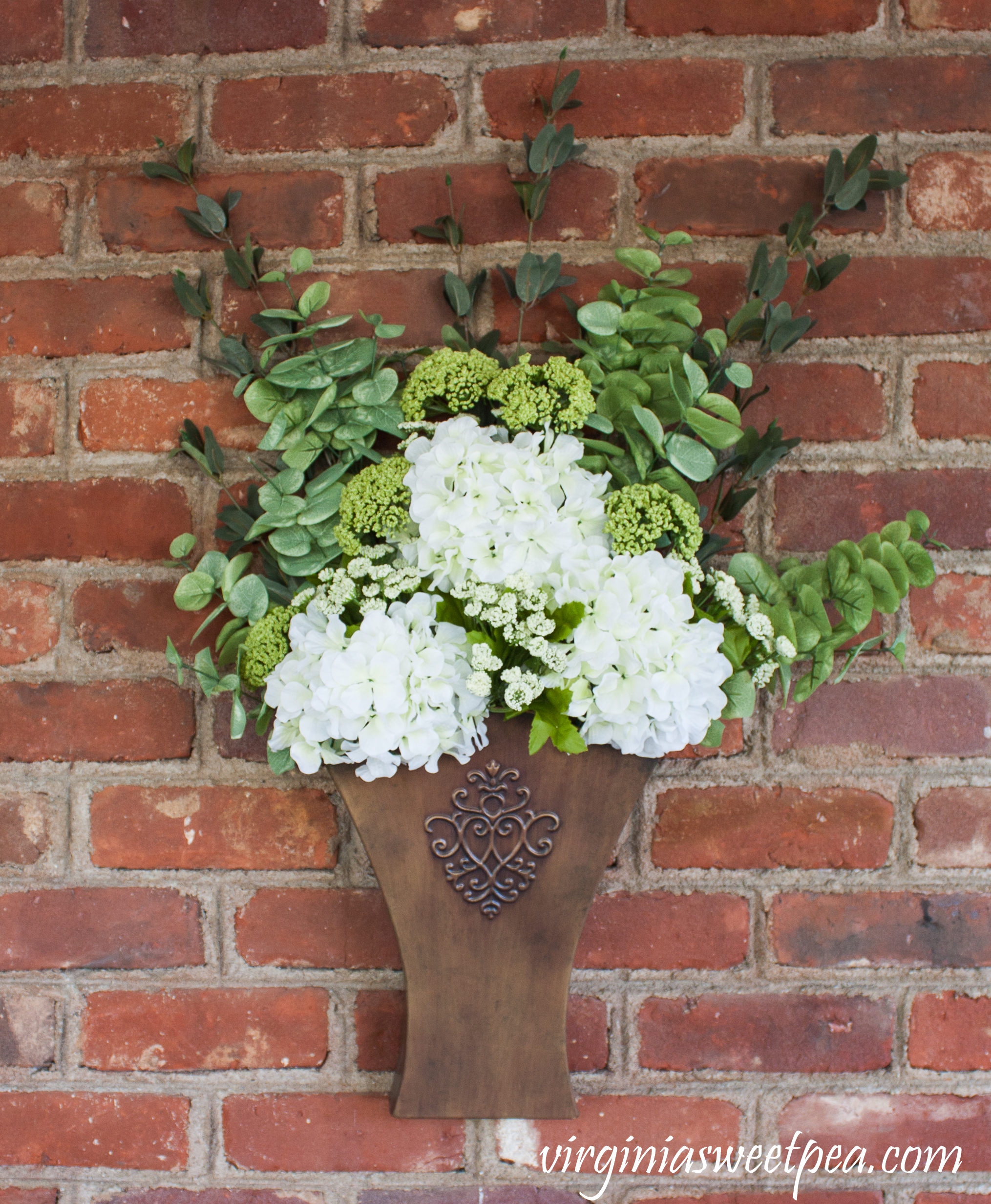 Floral Arrangement in a Southern Living at Home Willow House Flower Market Door Bucket