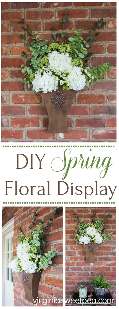 DIY Spring Floral Display - Learn how to make a floral display like this to display in your home. This would look great hanging on a door or on a porch wall. #springdecor #springfloralarrangement #springwreath #springdecorating