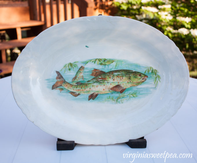 Antique fish platter displayed using a DIY wood display stand