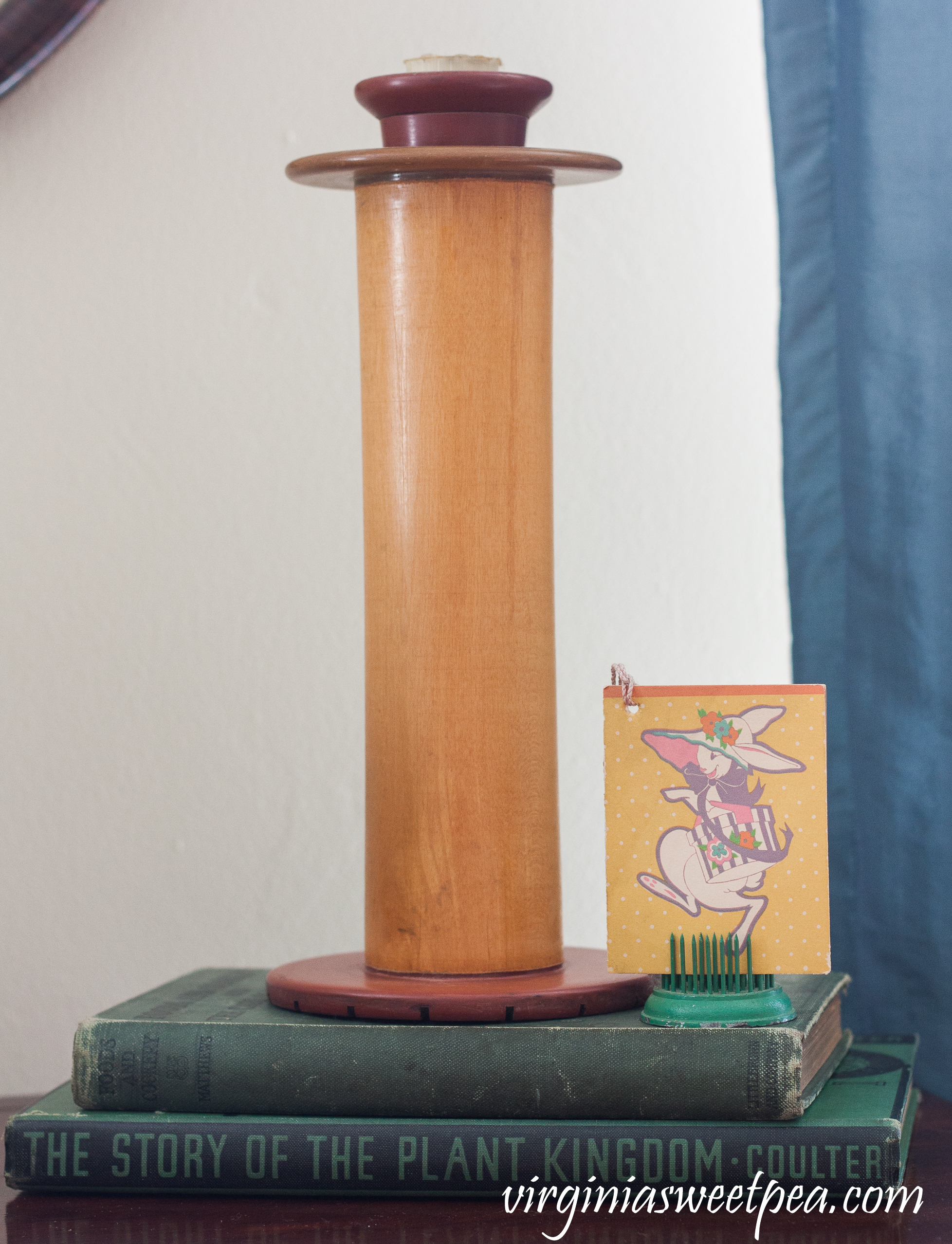 Easter Vignette with Art Deco Rabbit Bridge Tally, Vintage Books, and Vintage Spool