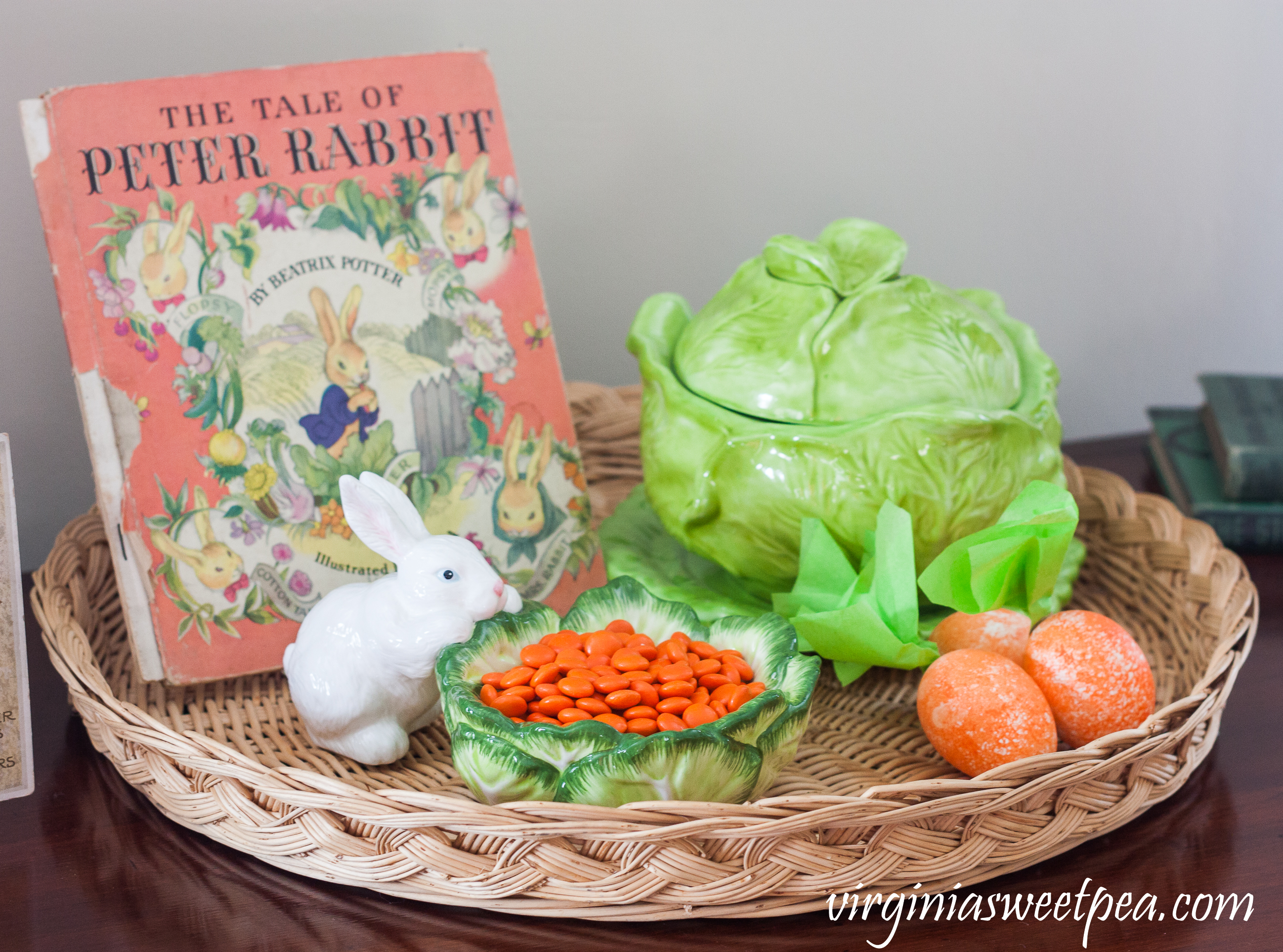 Easter vignette with a 1942 The Tale of Peter Rabbit book and lidded cabbage server