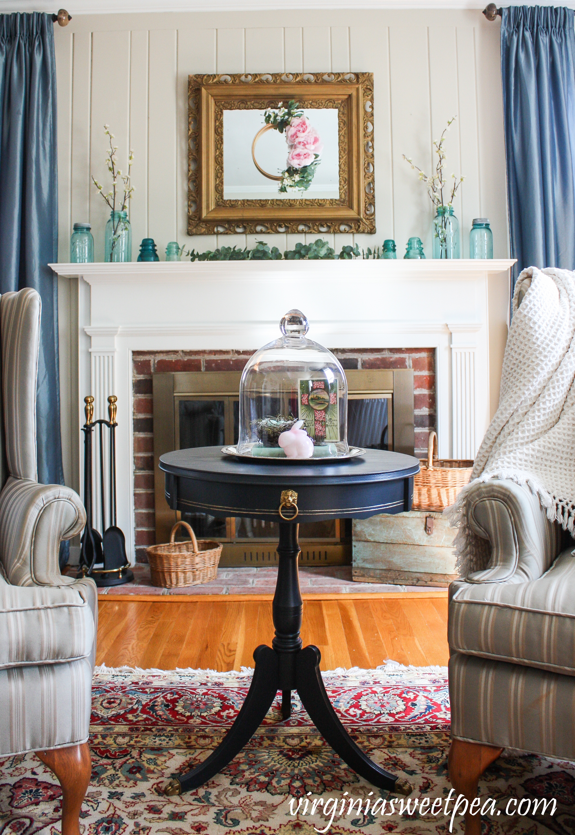 Spring Mantel Decorated with Mason Jars and Insulators with an Embroidery Hoop Wreath on a Vintage Mirror 