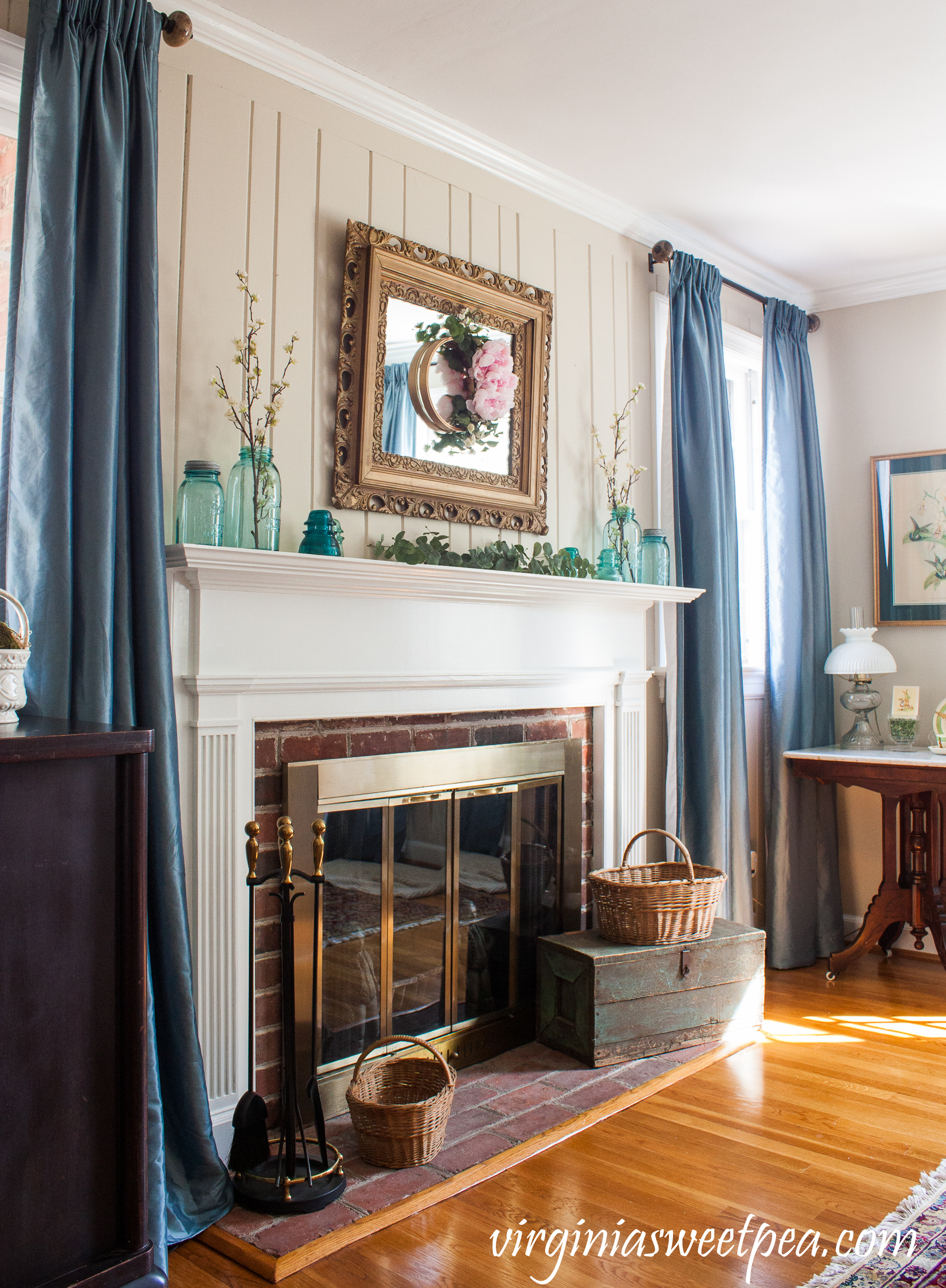 Spring Mantel with Vintage Ball Jars, Insulators, and Baskets