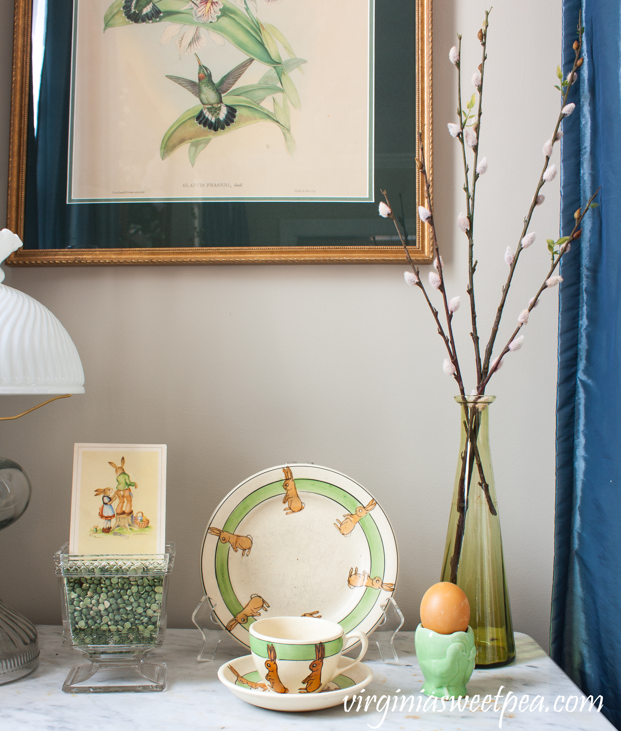 Easter Vignette with Roseville bunny dishes and a vintage egg cup #roseville #antiques #vintagedecor #eastervignette #easterdecorations