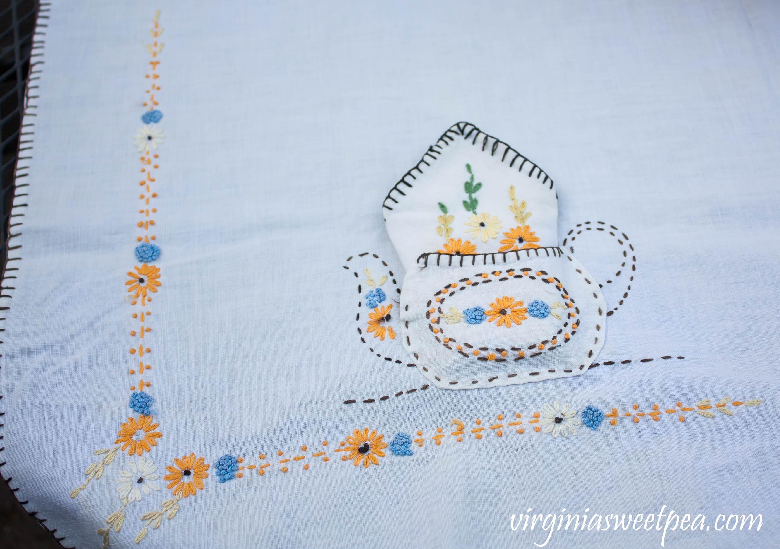 Embroidered Tablecloth from the early 1930's featuring tea pots.