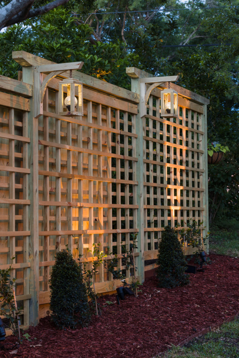 DIY garden screen trellis with DIY hanging lanterns