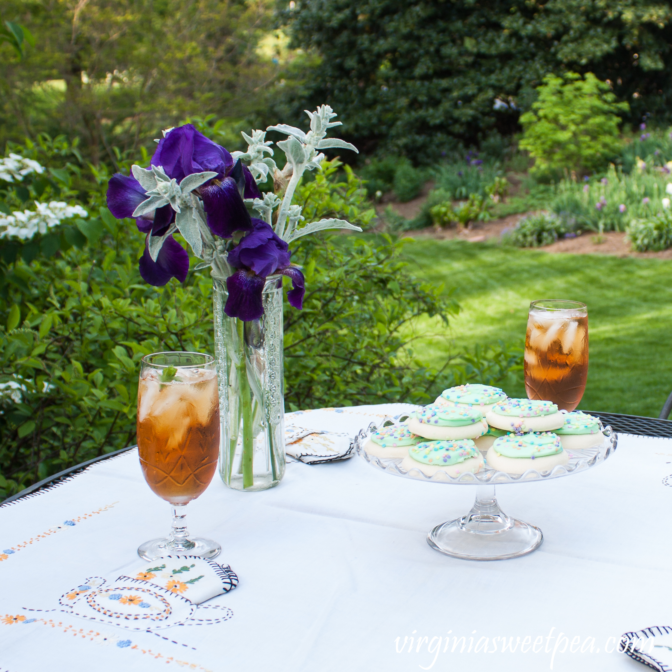 Spring Tea Party with Vintage - A garden tea party includes a table set with vintage crystal, a vintage cake stand, and a tablecloth from the early 1930's.