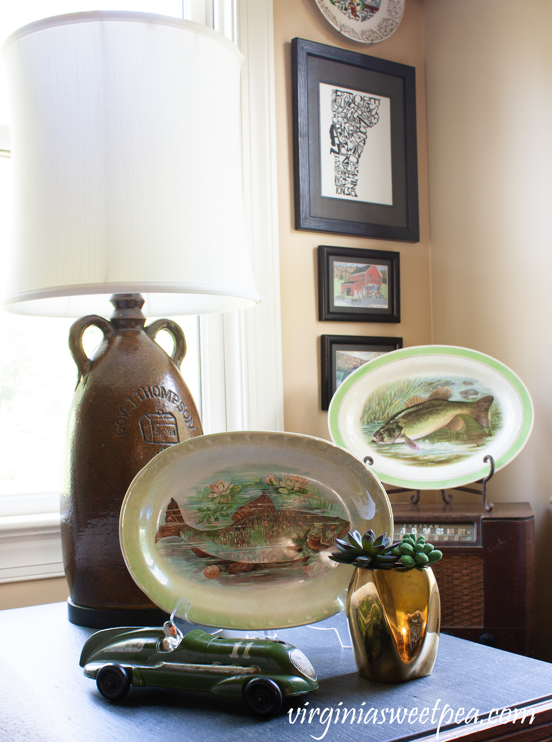 Fish themed summer vignette with a 1940's toy car. 