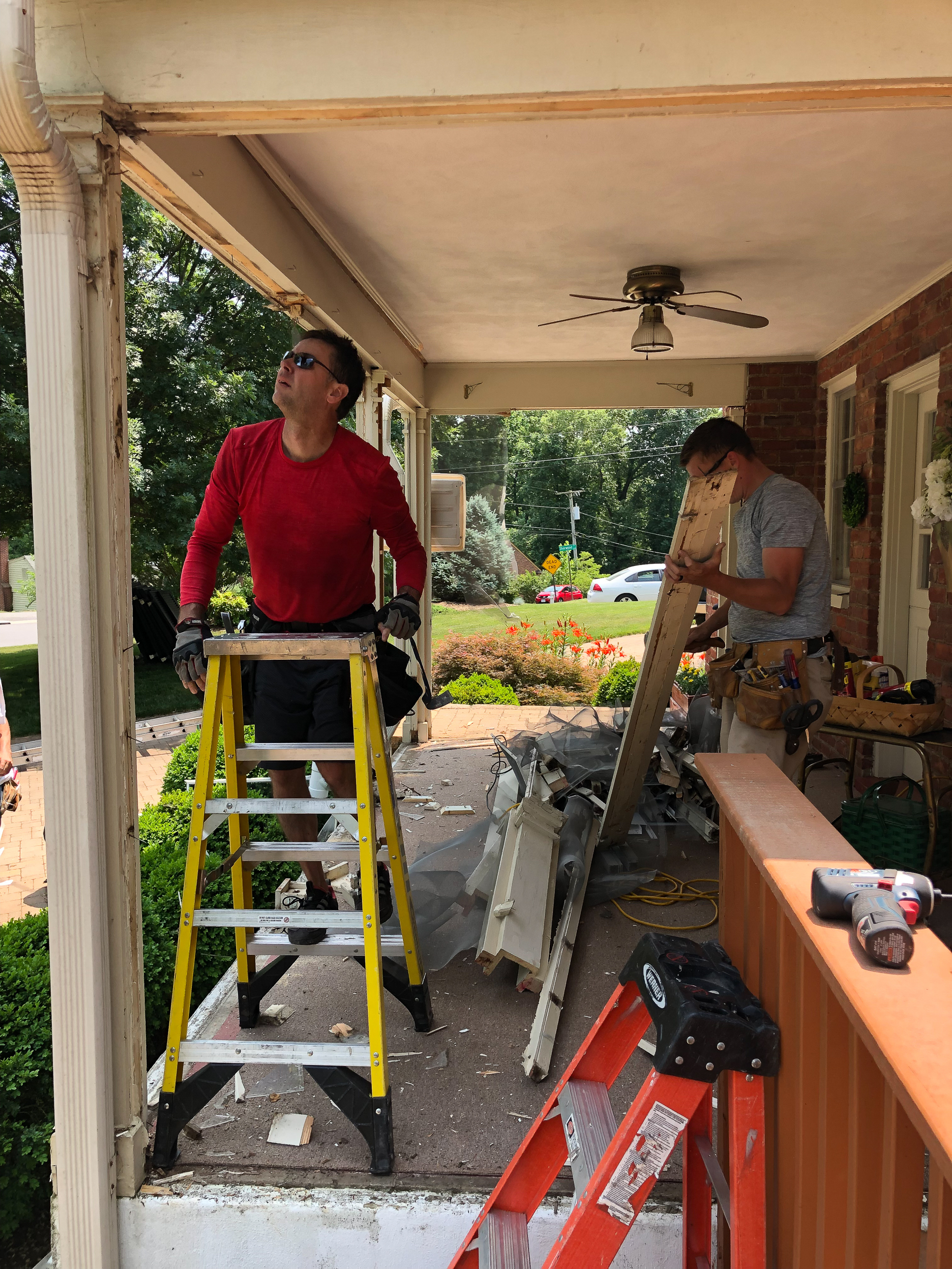 Converting a screened porch to a sunroom. Progress photo of the project.