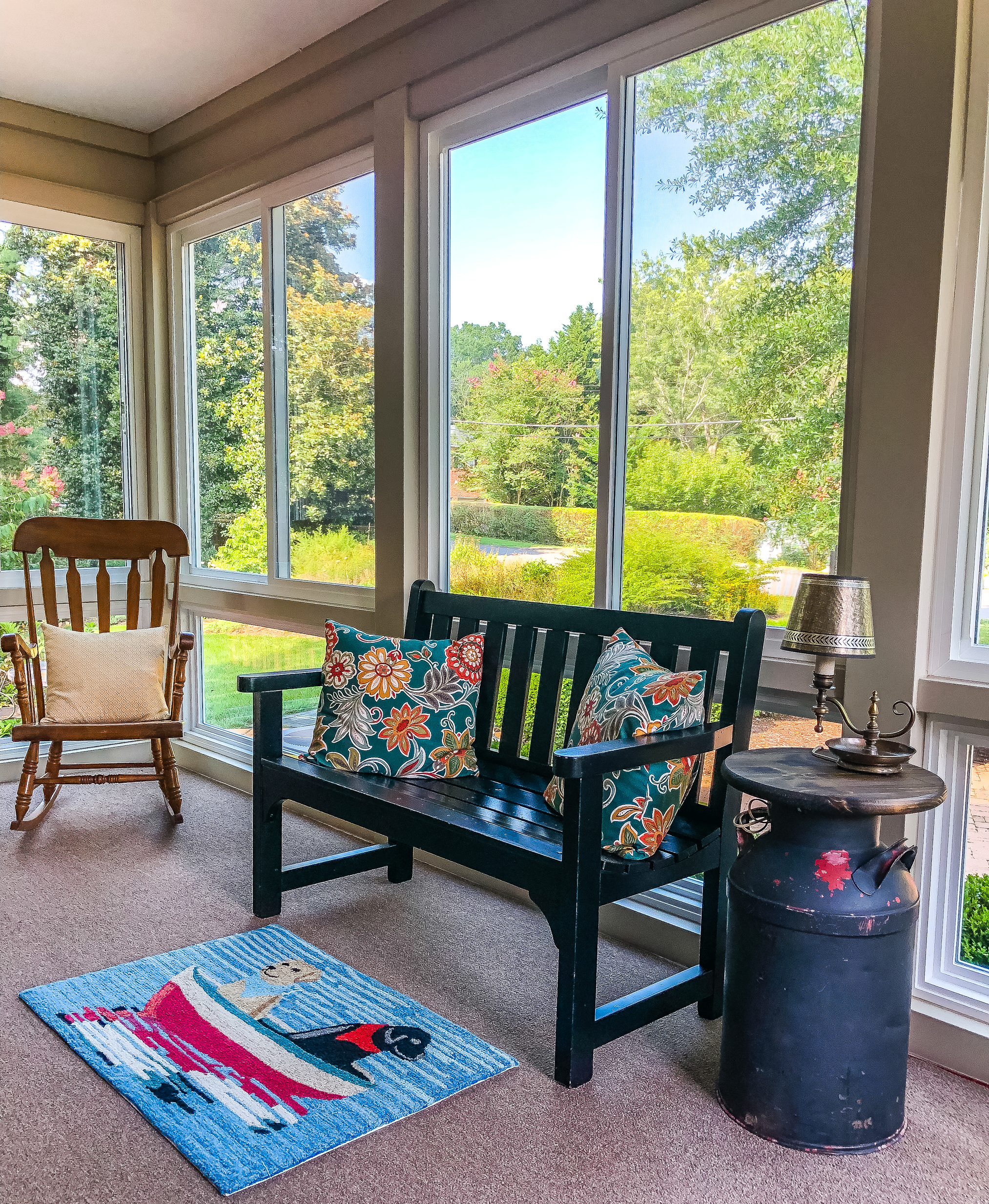Interior pictures of a screened porch converted to a sunroom.