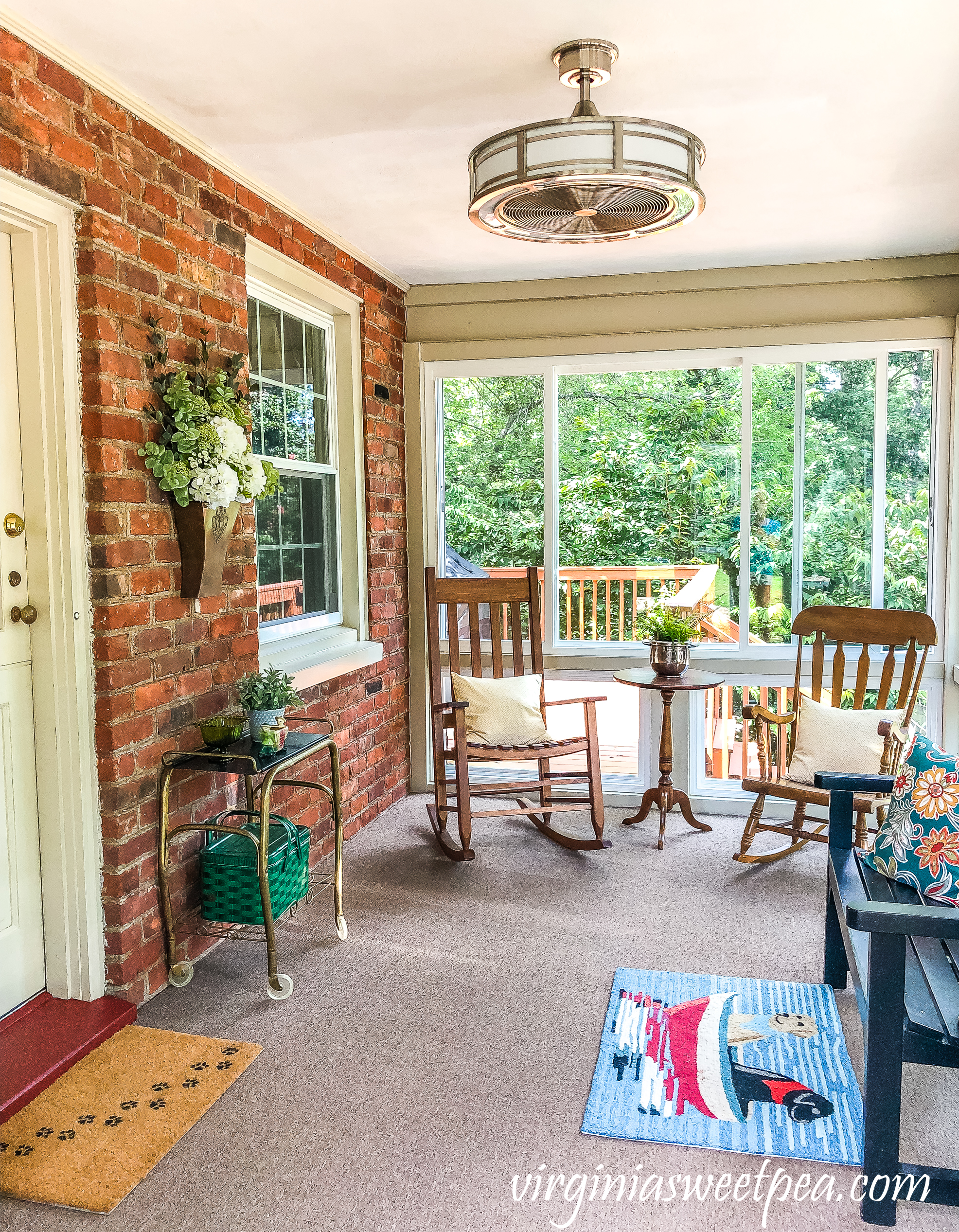 Home Decorators Collection Brette 23" Indoor/Outdoor Brushed Nickel fan from Home Depot installed in a sunporch.