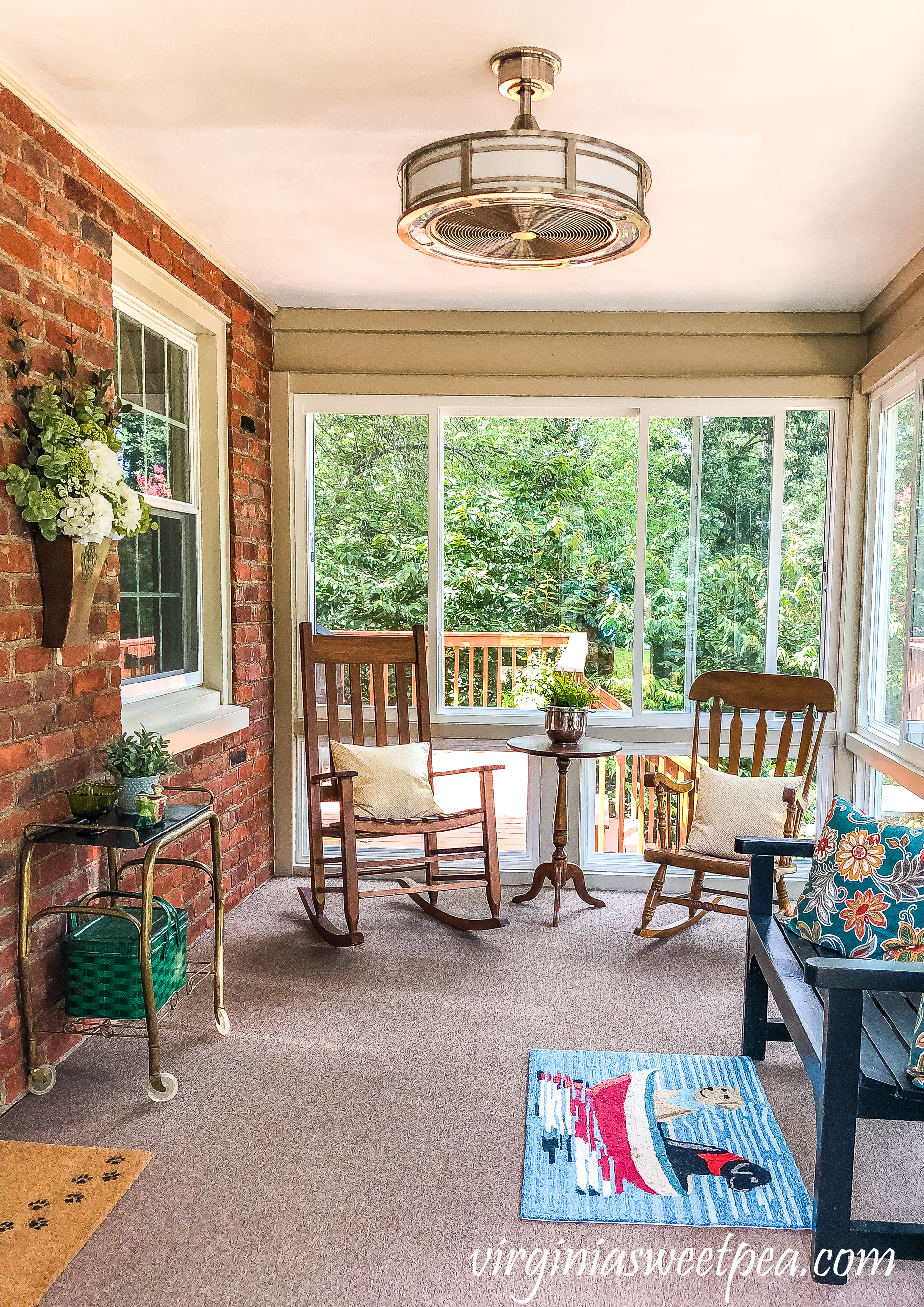 Home Decorators Collection Brette 23" Indoor/Outdoor Brushed Nickel fan from Home Depot installed in a sunporch.