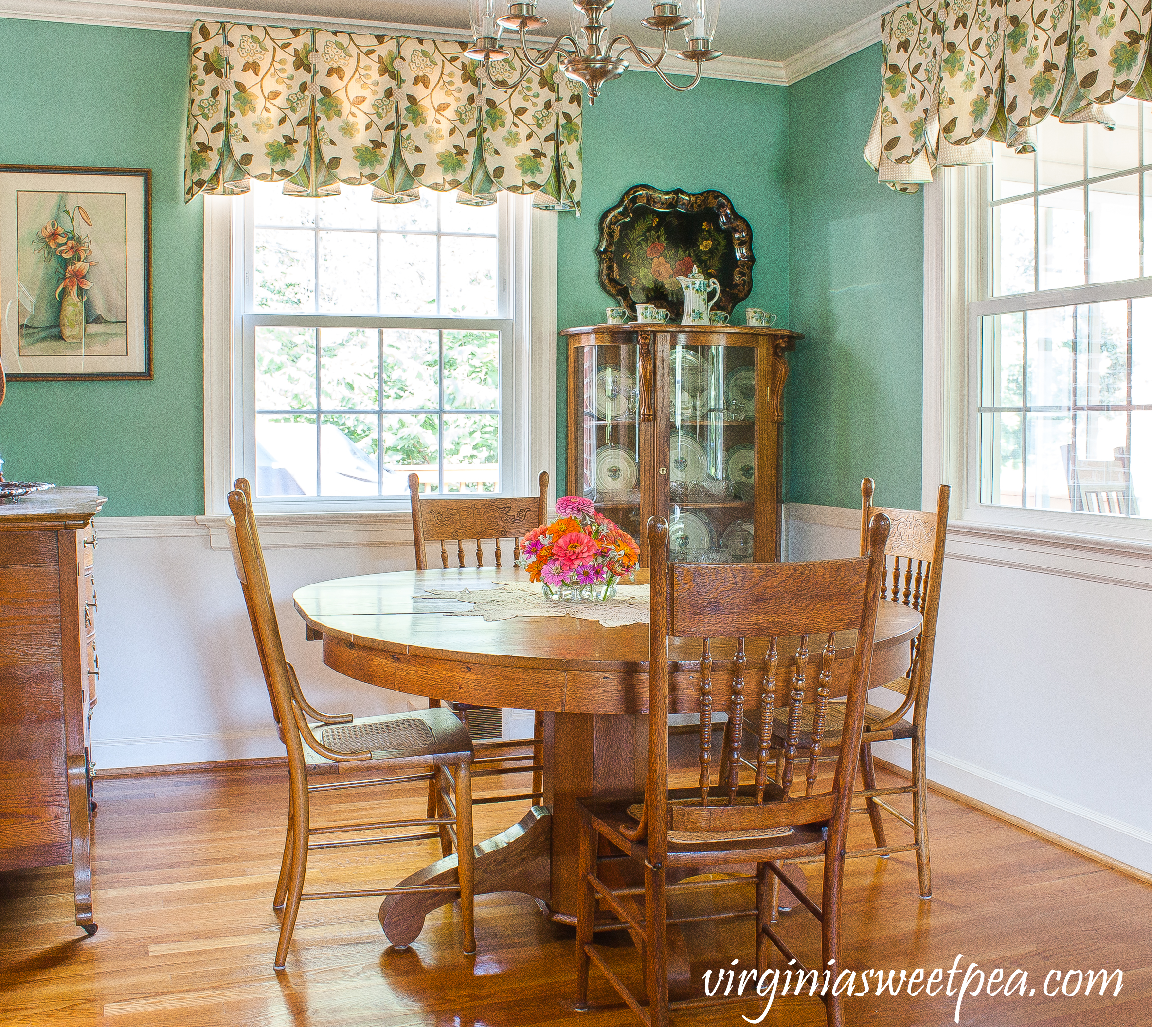 Dining room decorated with antique oak furniture.