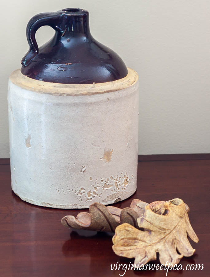 Vintage jug with clay leaves handcrafted in Seagrove, NC