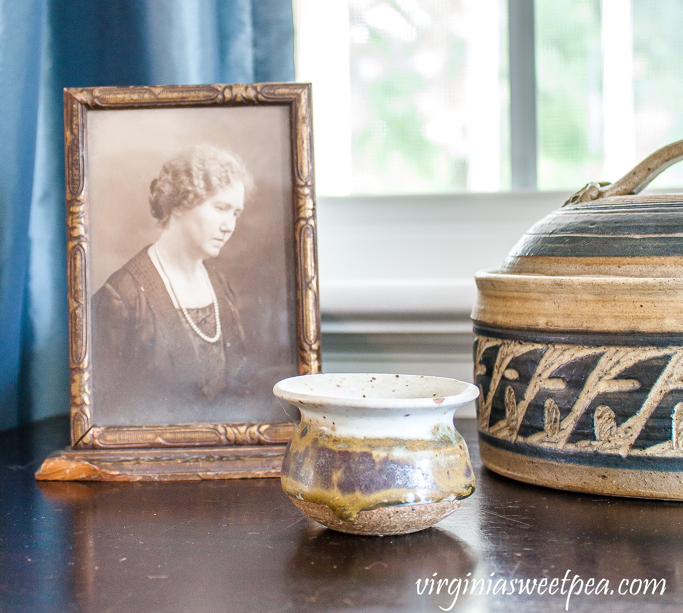 Vintage pottery used in an early fall vignette