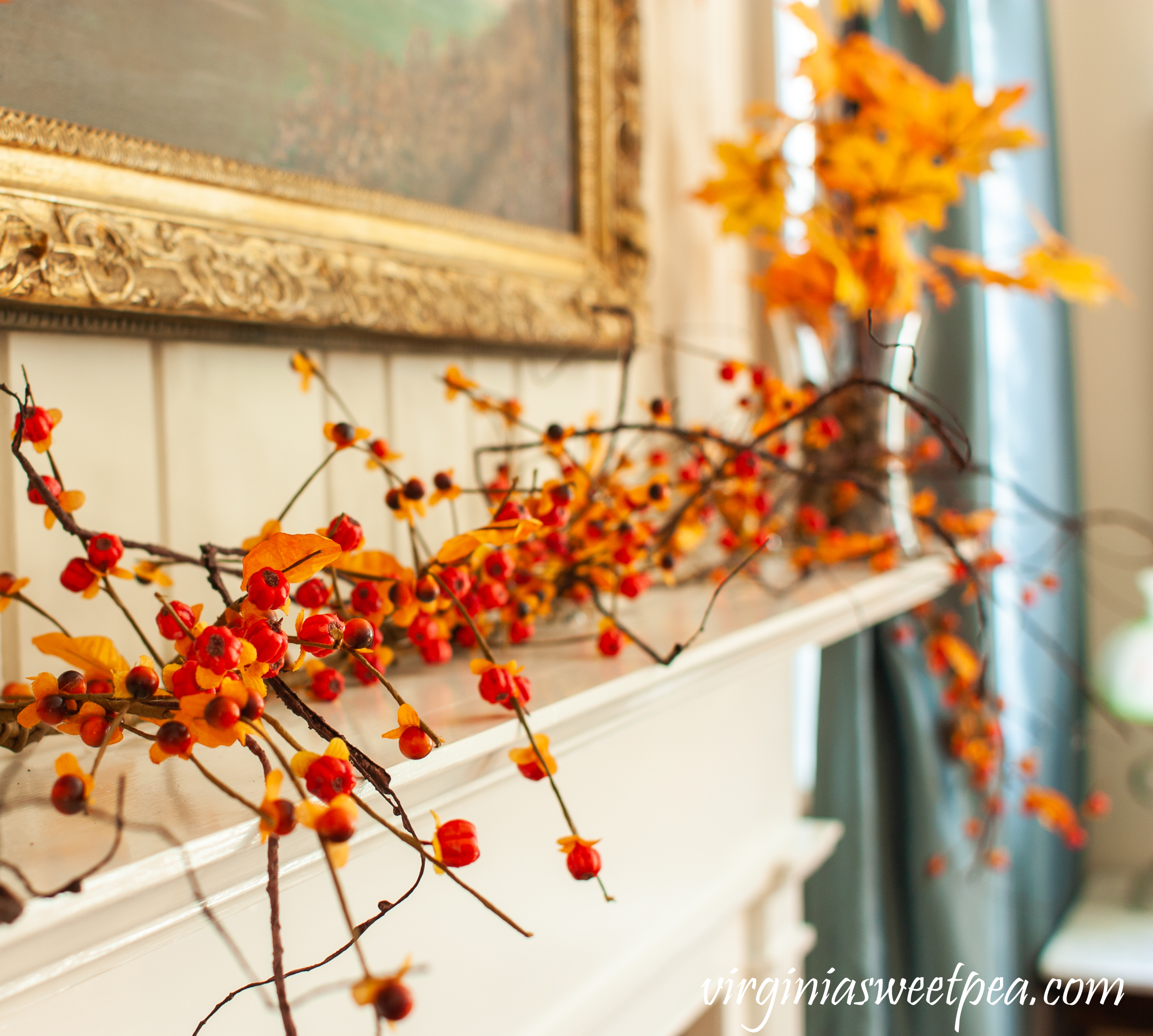 Bittersweet used to decorate a mantel for fall.