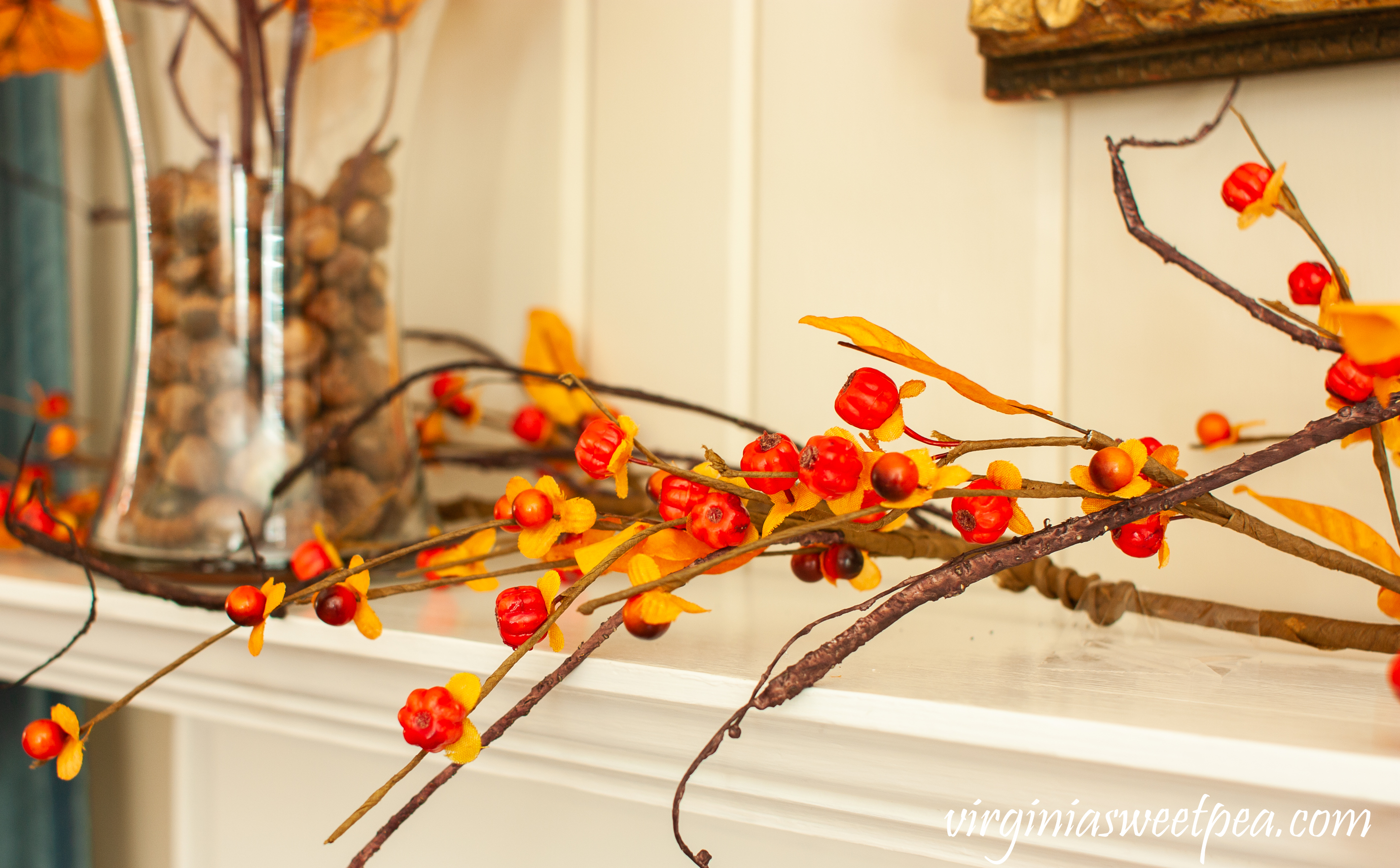 Bittersweet used to decorate a mantel for fall.