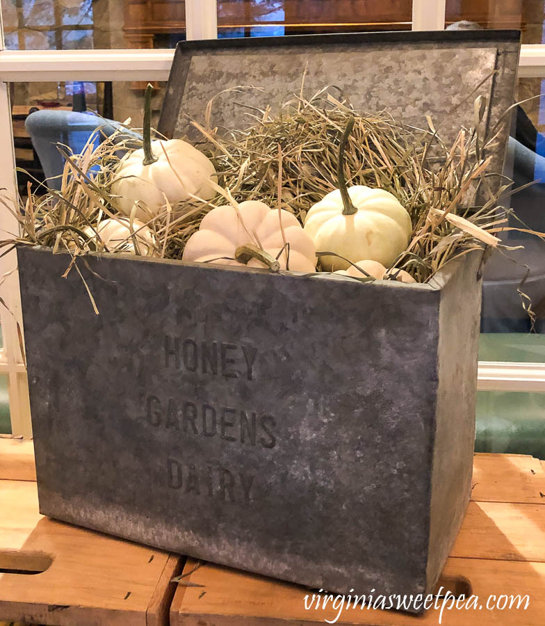 Vintage milk box decorated for fall at the Woodstock Inn in Woodstock, Vermont