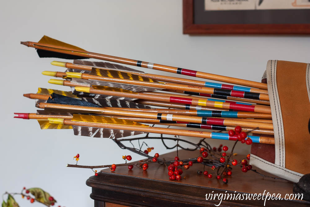 A 1960's stereo is decorated for Thanksgiving with a vintage quiver and arrows.