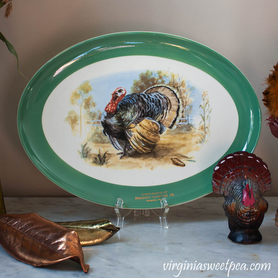 Vintage turkey platter with a vintage turkey candle