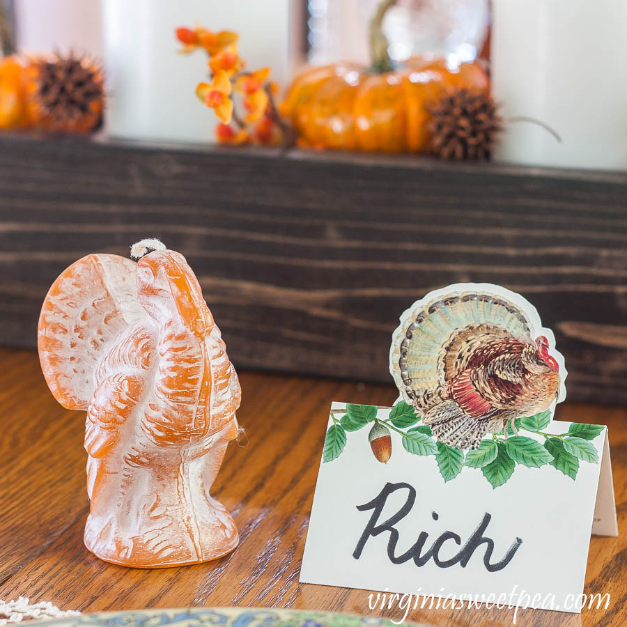 Thanksgiving place setting with a Caspari turkey place card and a beeswax turkey from the Beeswax Candle Company in Lynchburg, VA